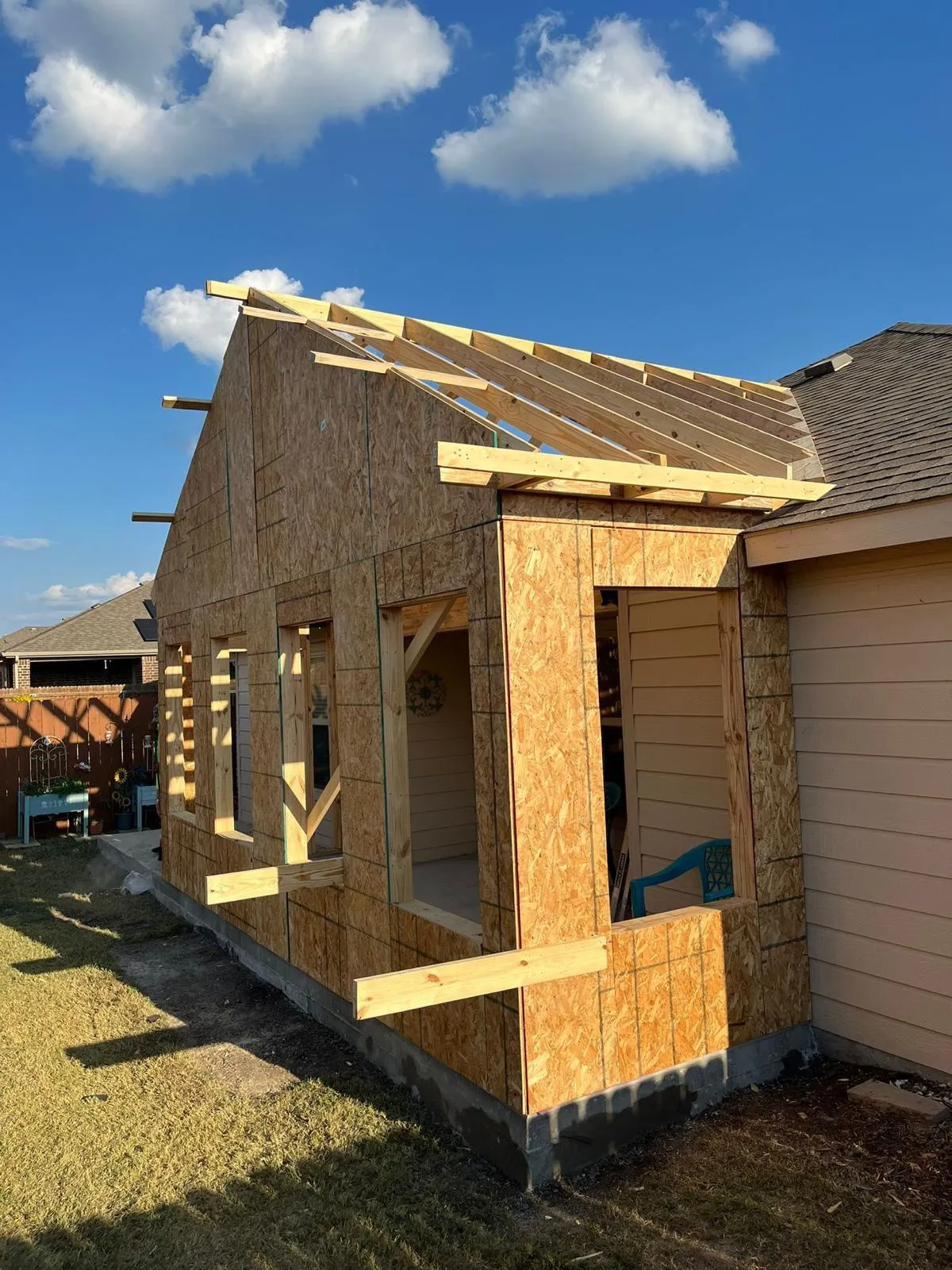 Room addition framing and roof structure