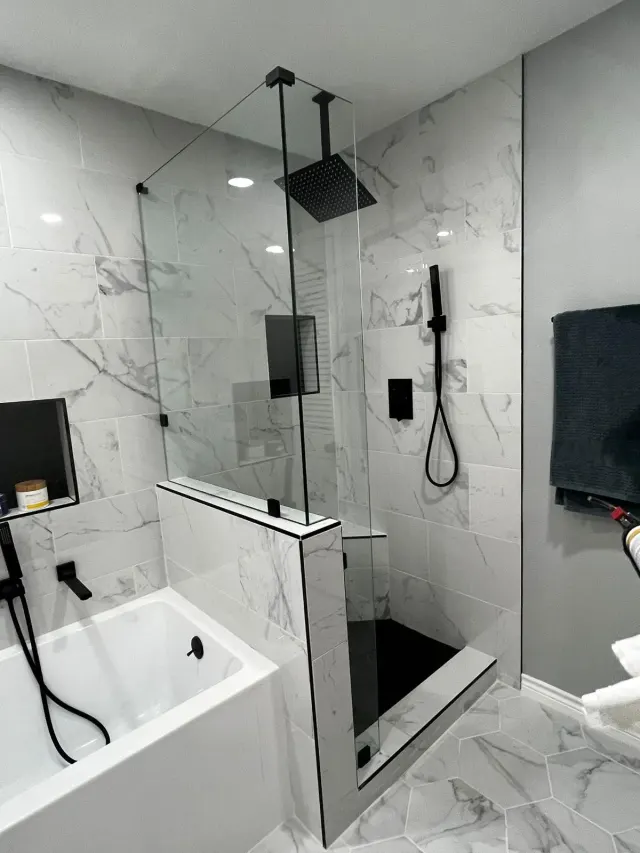 Remodeled bathroom with soaking tub, half wall and walk-in shower with ceiling rain head, Dallas