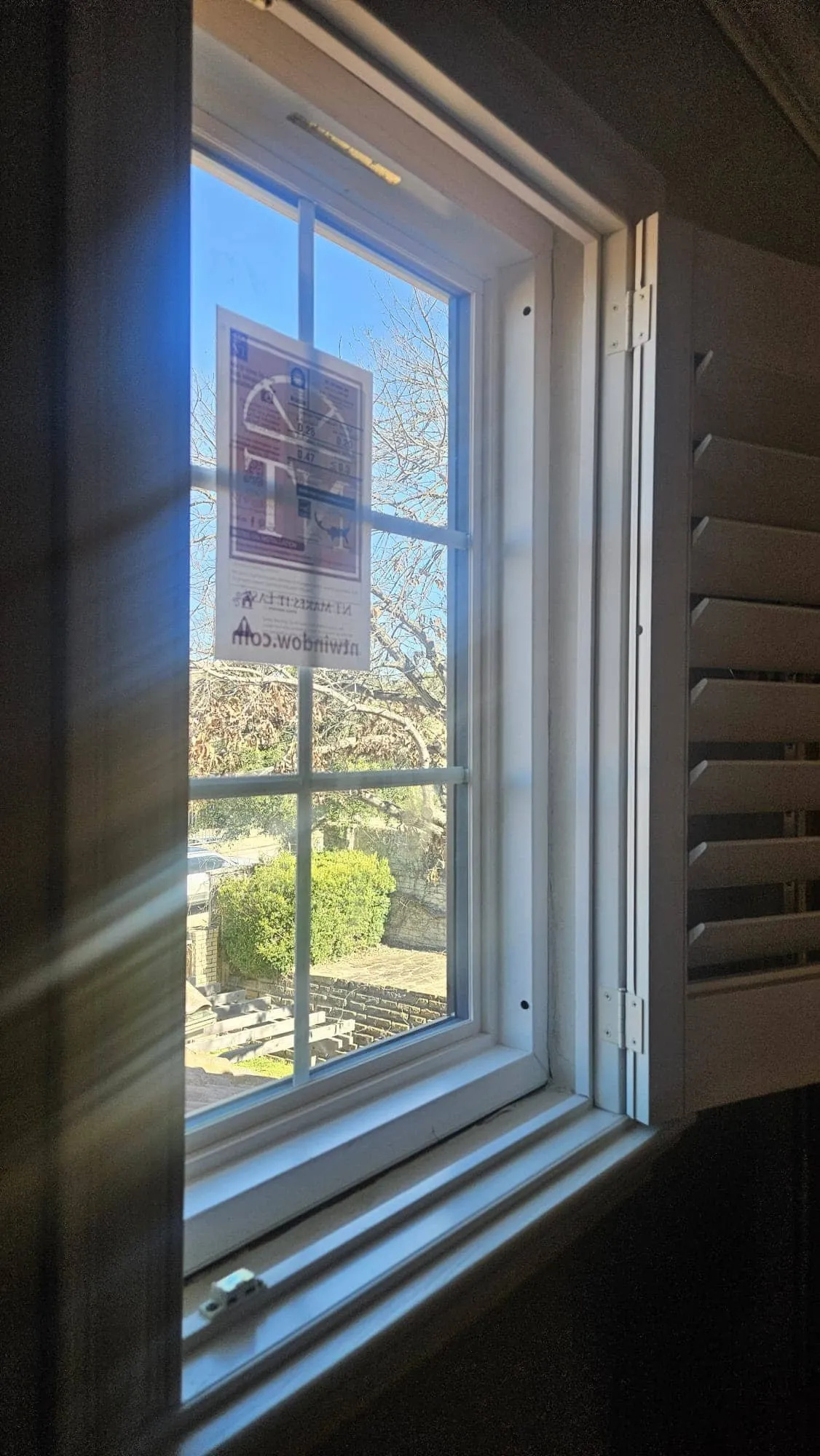 New window from inside with plantation shutters